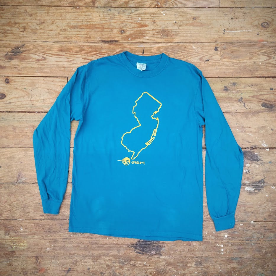 A long sleeve t-shirt in blue depicting the state of New Jersey.