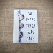 Personal notecard with a 'We Heard There was Cake! dogs design on the front.
