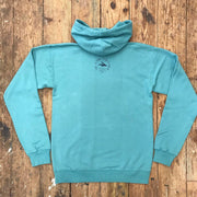 Seafoam Green hoodie featuring the 'Flying Fish' logo on the back neck in navy ink.