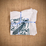 Napkin set of the 'Veggies' design in green ink.