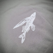 Close-up of the 'Flying Fish' design on the bottom back in white ink.