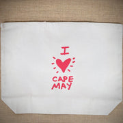 Natural, canvas tote bag that reads, 'I (heart) Cape May' in red ink.