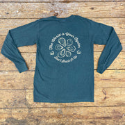 Blue long-sleeve featuring the 'World is Your Oyster, Don't Shuck it Up' design on the back in cream ink.
