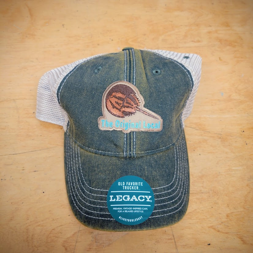 Green, trucker hat with an 'Original Local, Horseshoe Crab' patch on the front.