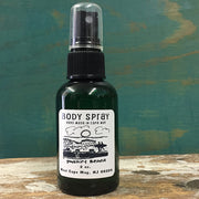 2 oz bottle of 'Poverty Beach' body spray.