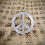 Patch of a silver peace sign.