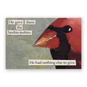 Image of a magnet with a stylized illustration of a cardinal on a textured background with text that reads, "He gave them the heebie-jeebies. He had nothing else to give."