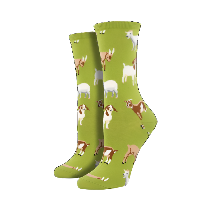 A pair of green socks with goats on them.