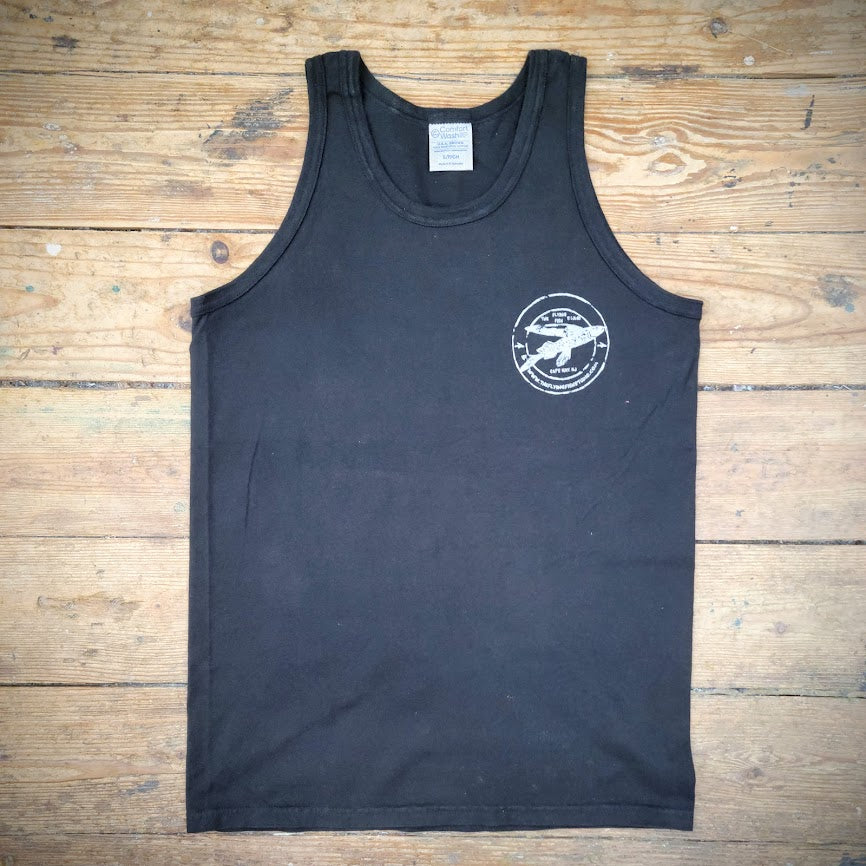 Black tank top with the 'Flying Fish Studio' logo printed on the left chest in silver ink, laid flat on a wooden surface.