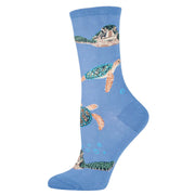 A pair of blue socks with turtles on them.