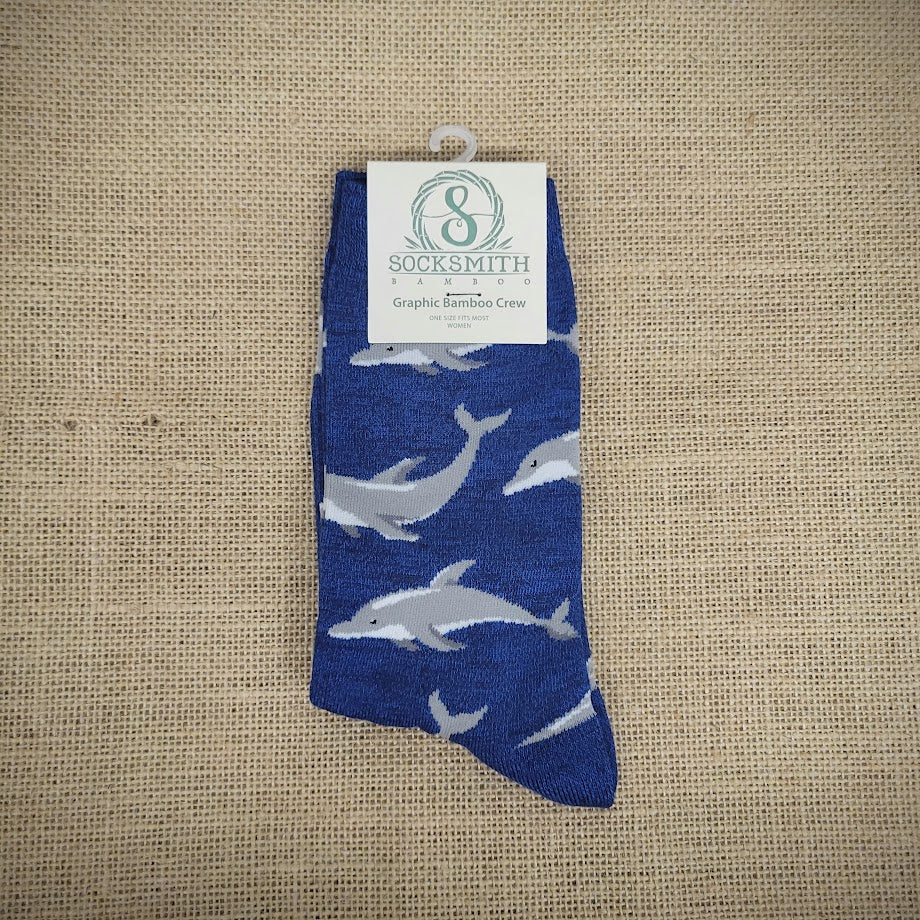 A pair of navy socks with a dolphin design.