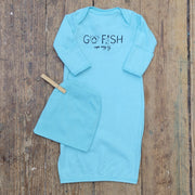 Light blue layette featuring a 'Go Fish! Cape May' design on the front in black ink.