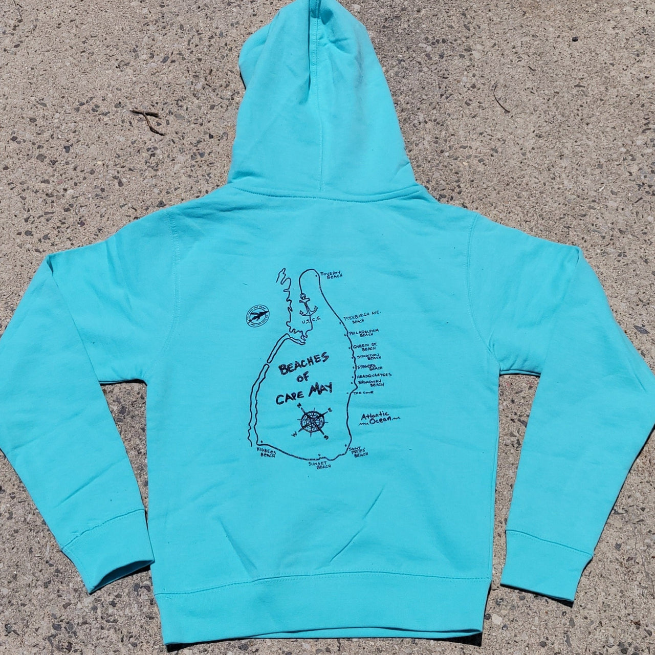 Aqua Blue, pull-over hoodie featuring the 'Beaches of Cape May' design on the center back in navy ink.