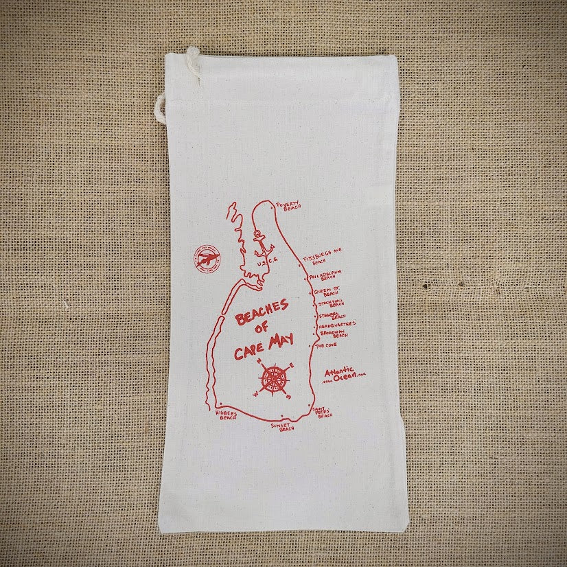 Natural, canvas wine bag that features the beaches of Cape May in red ink.