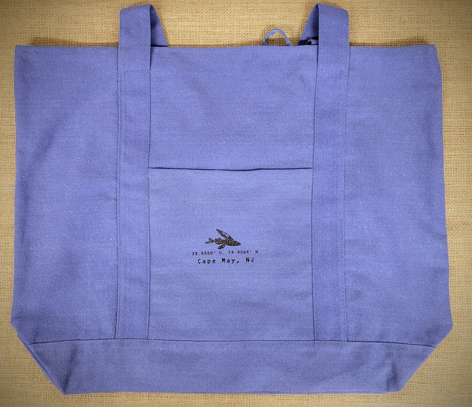 A purple-blue tote with the 'Flying Fish' coordinates on the front.
