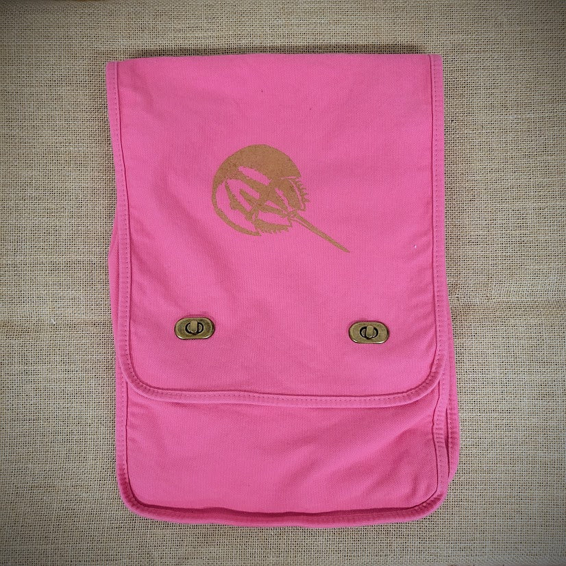 Pink, canvas bag with a brown horseshoe crab design on the front.