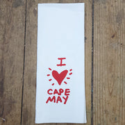 White, flour sack tea towel featuring the 'I (heart) Cape May' design in bright red ink.