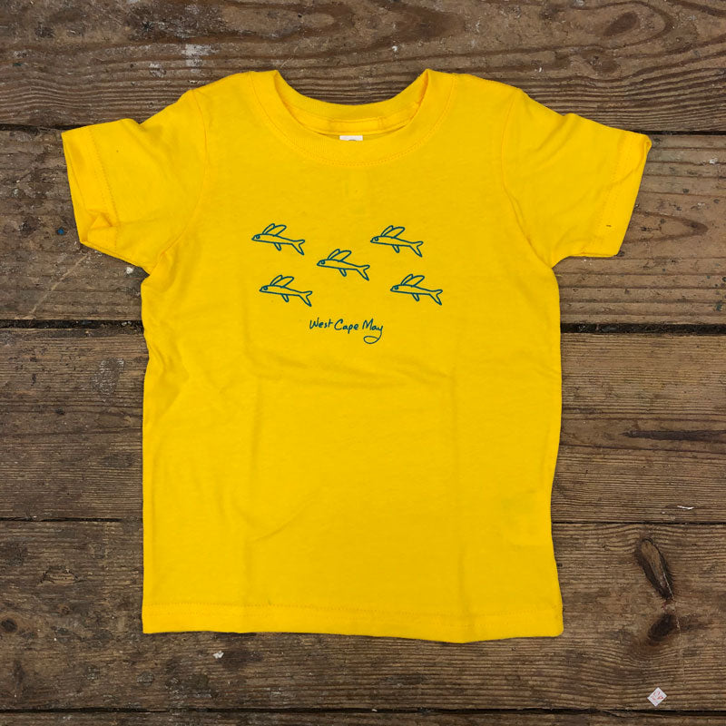 A bright yellow t-shirt with blue flying fish guppies on the front.