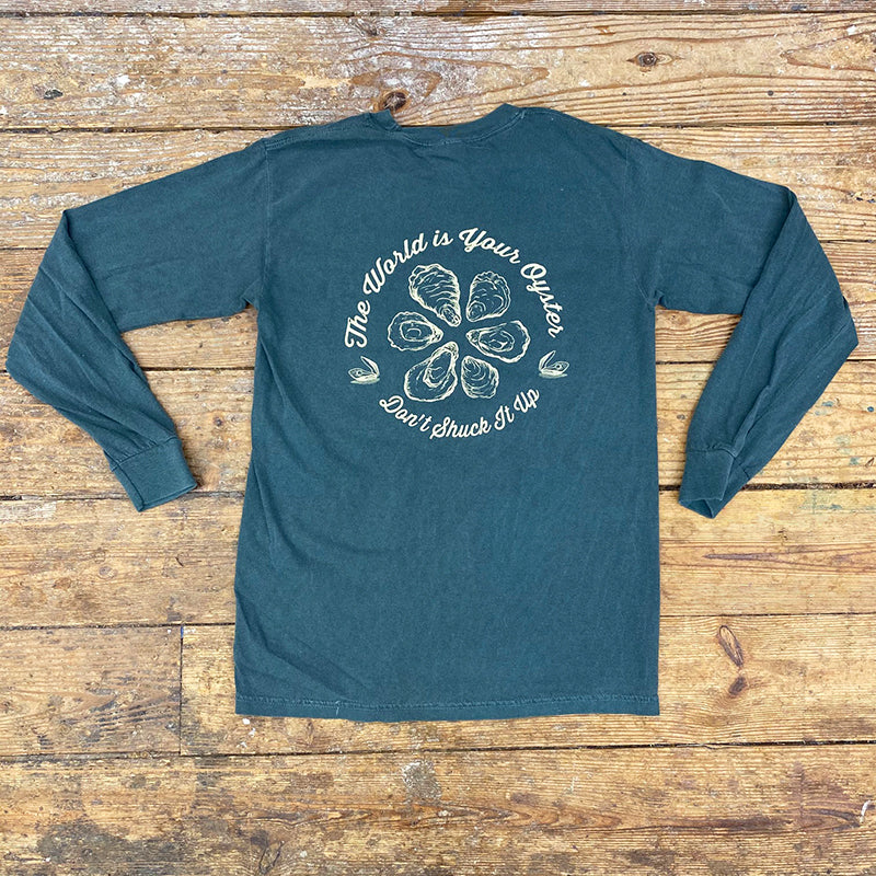 Blue long-sleeve featuring the 'World is Your Oyster, Don't Shuck it Up' design on the back in cream ink.