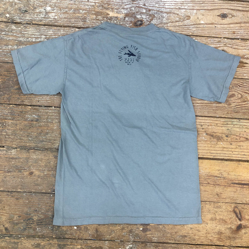 A grey t-shirt with the 'Flying Fish Studio' logo on the back neck with navy ink.