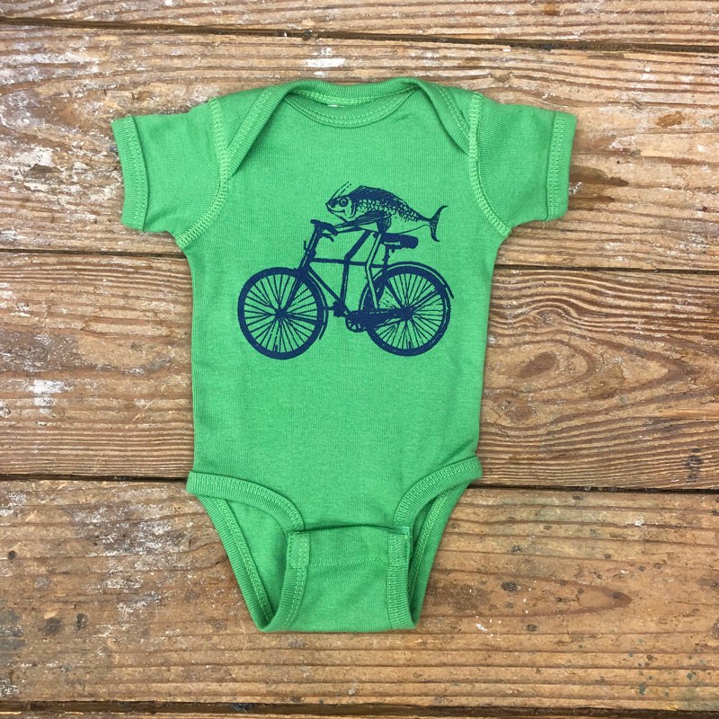 Light green onesie featuring a 'Fish on a Bike' design in navy blue ink.