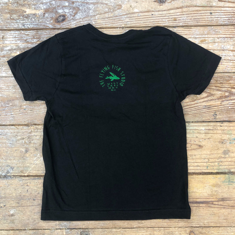 A solid black t-shirt featuring the 'Flying Fish Studio' logo on the back neck in green ink.