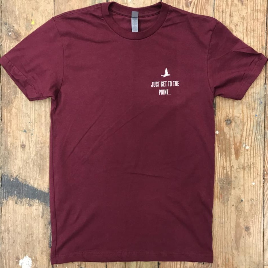 A maroon t-shirt with the words 'Just Get to the Point...' in white ink on the left chest.