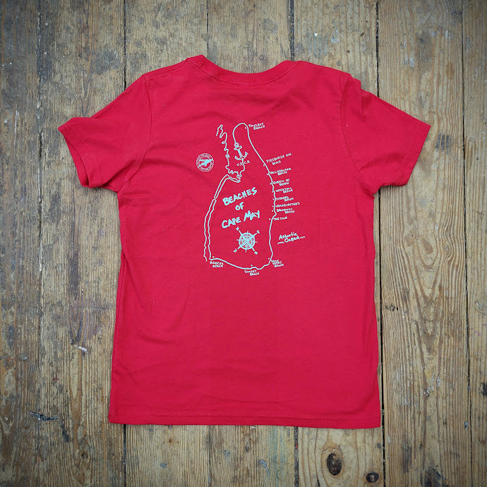 A bright red t-shirt with the beaches of Cape May printed on the back with blue ink.