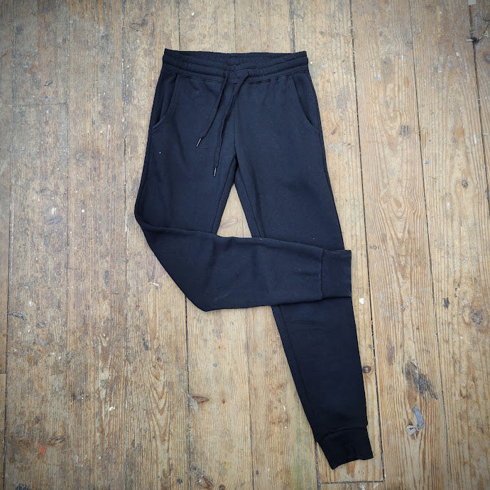 A pair of solid black joggers.