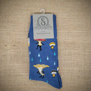 A pair of blue socks with fungi on them.