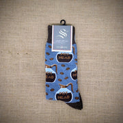 A blue and brown pair of socks with coffee pots on them.