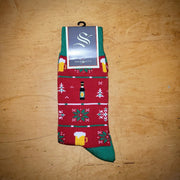 A pair of red and green Christmas beer socks.