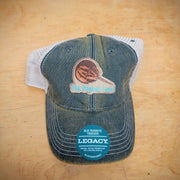 Green, trucker hat with an 'Original Local, Horseshoe Crab' patch on the front.
