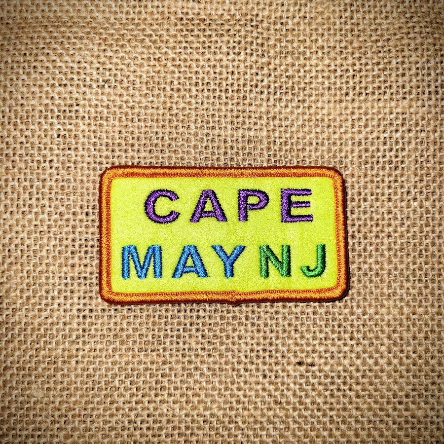 Yellow, rectangle patch in yellow that features, 'Cape May, NJ.'