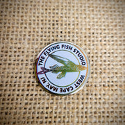 A Flying Fish Studio pin.