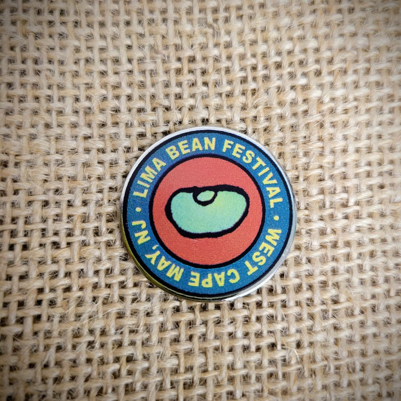 A Lima Bean Festival pin.