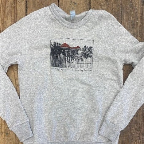 A heather grey sweatshirt with the 'Saint Mary's by The Sea' design on the front in red and black ink.