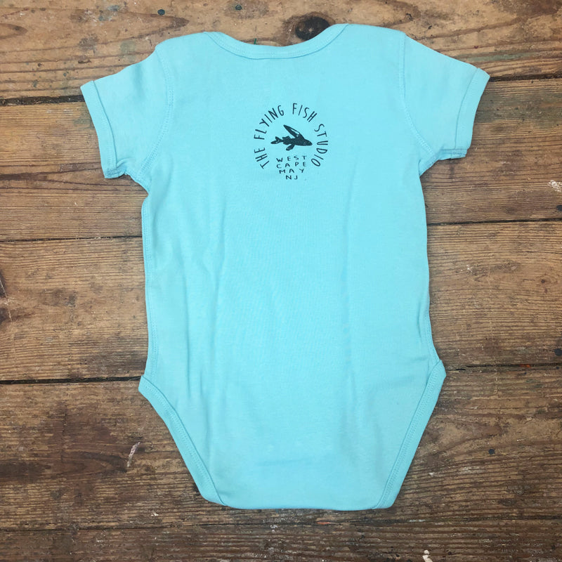 Aqua blue onesie featuring the 'Flying Fish' logo on the upper back.