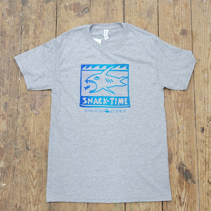 A grey t-shirt featuring the 'Snack-time' shark design on the front in blue ink.