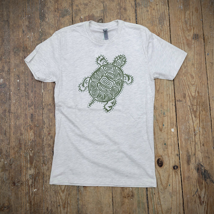 An oat-heather t-shirt with a green 'Turtle' design on the front.