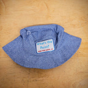 A blue. bucket hat with a 'What's the Point?' patch on the front.