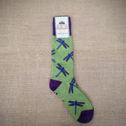 A green pair of boot socks with dragonflies on them.