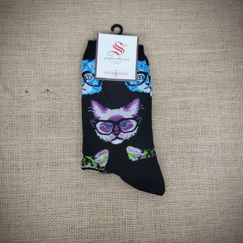 A pair of black socks with cats wearing glasses on them.