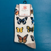 Khaki, women's socks with an assortment of butterflies on them.