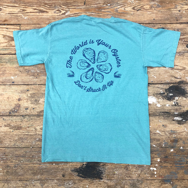 A blue t-shirt with the 'The World is Your Oyster, Don't Shuck it Up' design on the back.