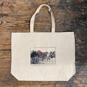 A tote bag with the 'Saint-Mary's by The Sea' design on the front.
